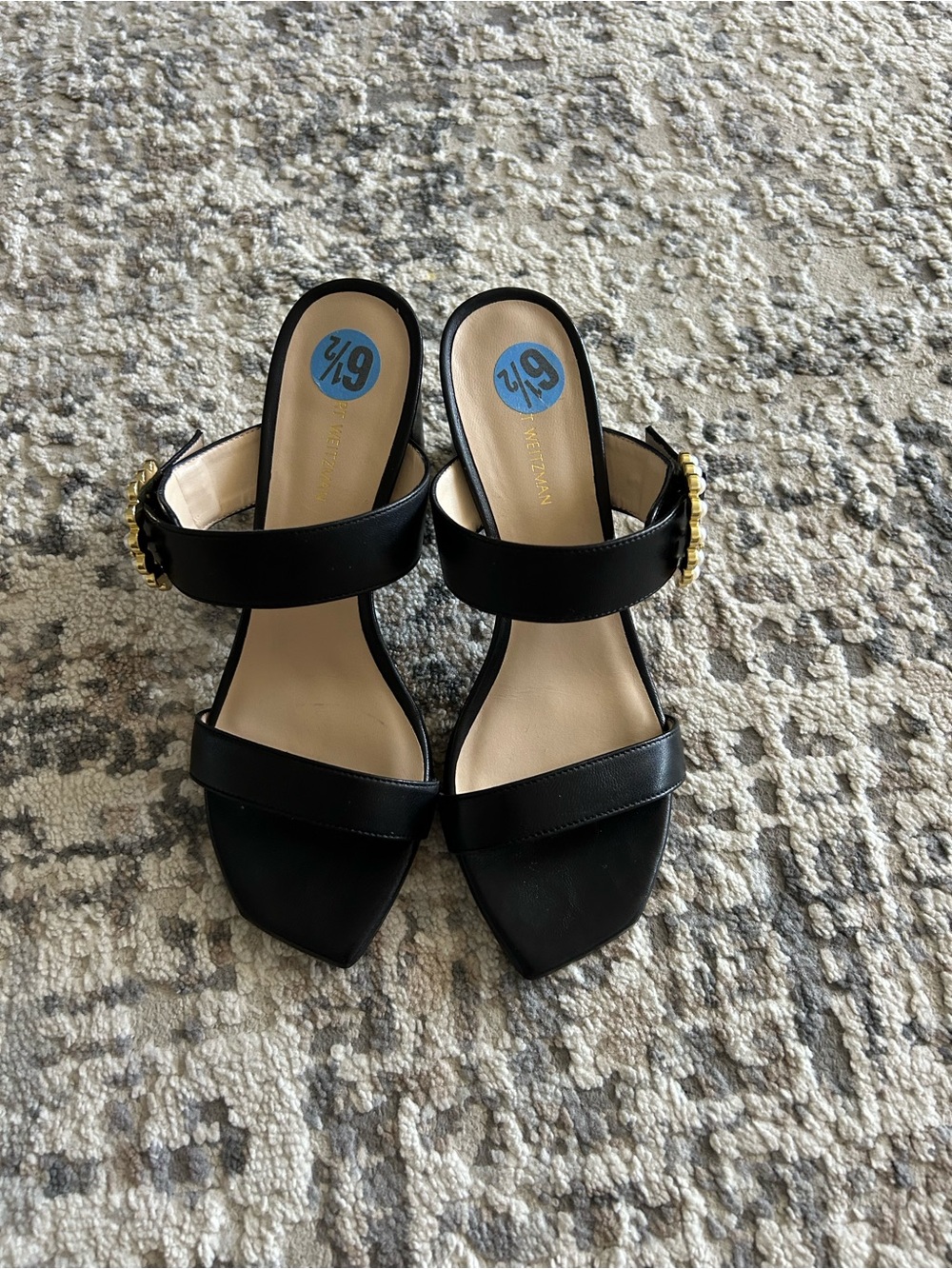 Stuart Weitzman Black Leather Open-Toe Mules with Gold Buckle